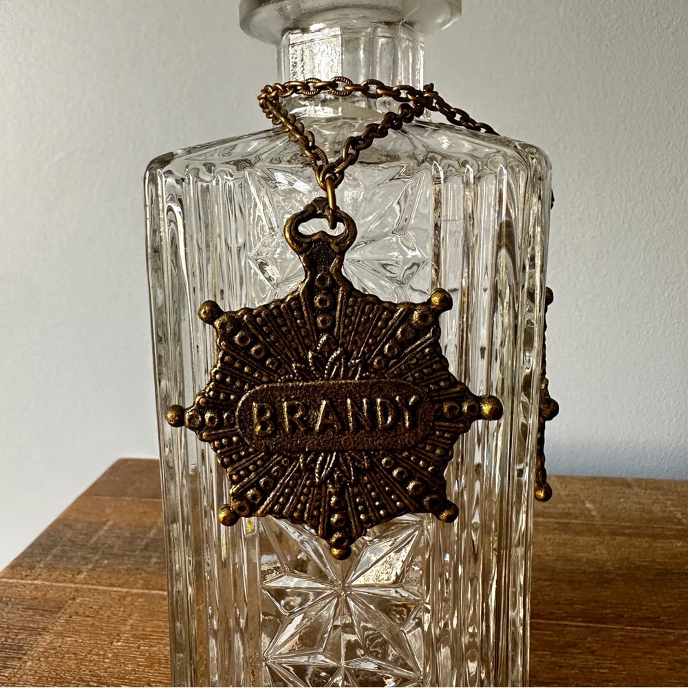 Vintage square cut-glass liquor decanter with a reversible metal medallions - Picture 3 of 7